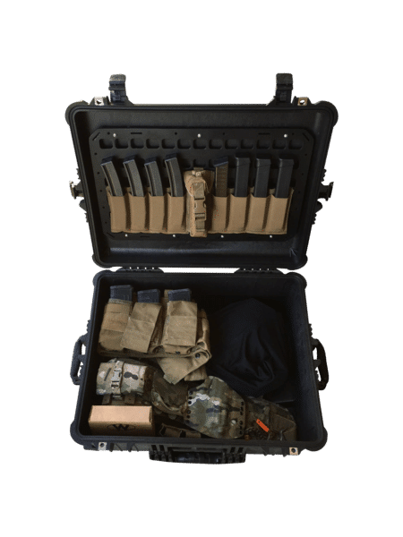 magazines and ammo set up with molle panel in case