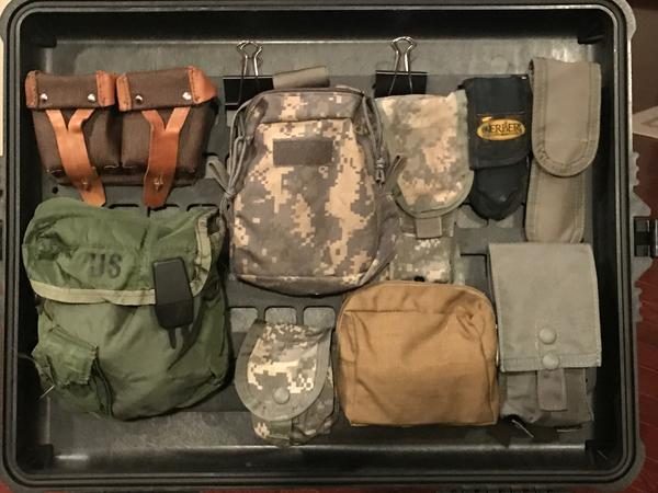 Up close of molle gear on molle panel attach to case