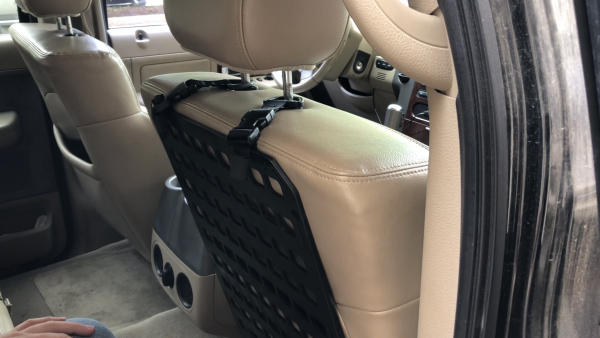 Buckle D-Ring RMP Straps™ [Headrest Post] attached to molle panel