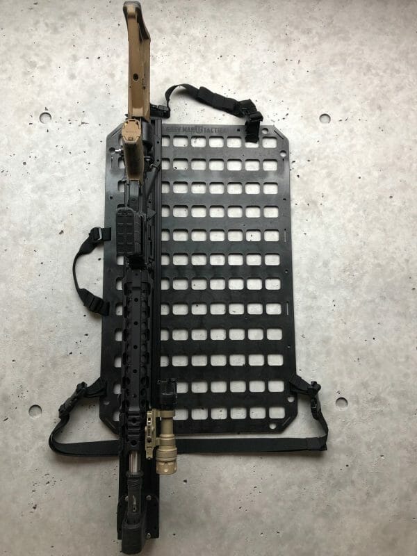 Vehicle locking rifle rack raptor rail buffer tube rack with rifle locked in place