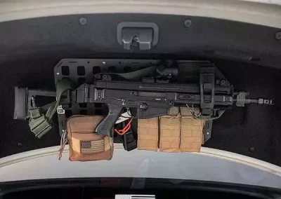 Ar15-mounted-to-the-trunk-of-a-car-with-magizens